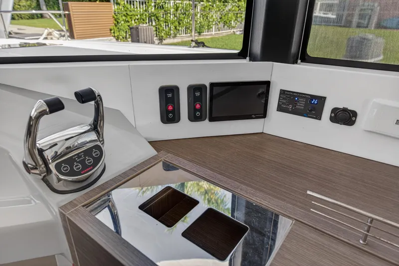 Slide: The Image of Control panel of 2022 Leopard 53 Powercat with modern navigation and control systems. - 77