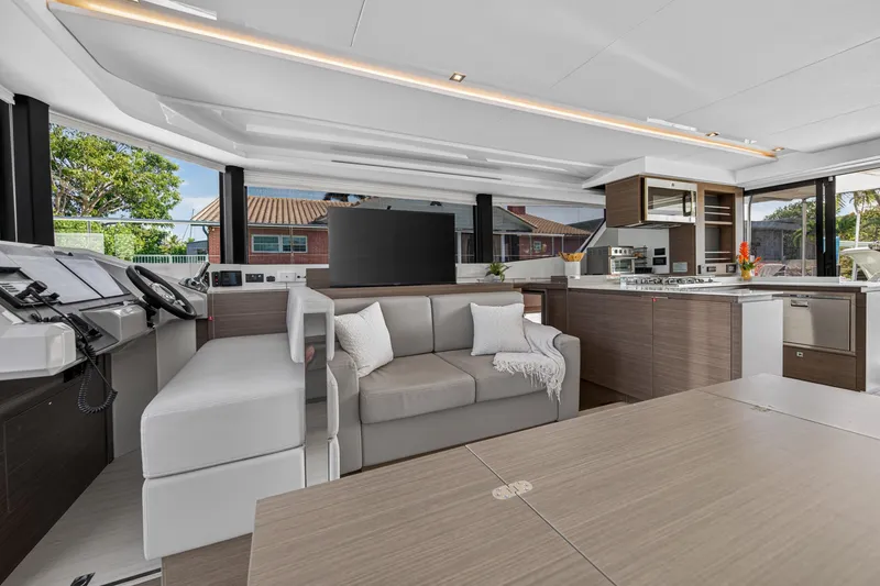 Slide: The Image of Luxurious interior of 2022 Leopard 53 Powercat yacht with modern kitchen and seating area. - 78