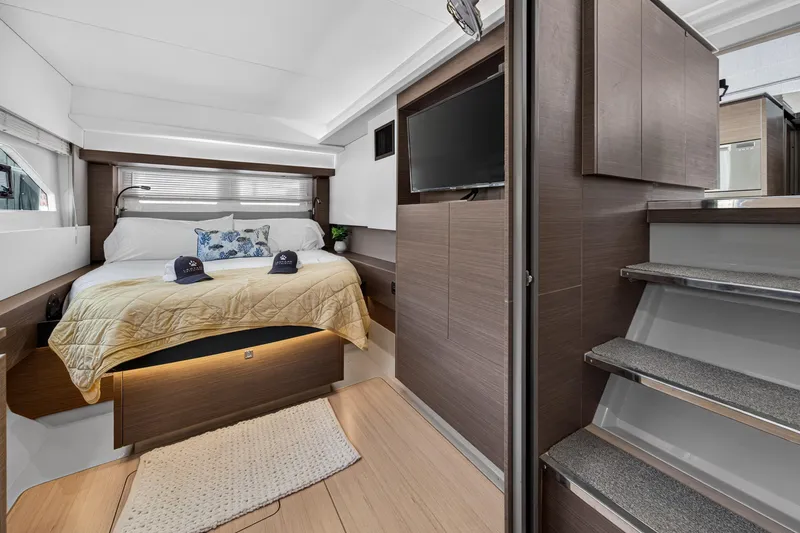 Slide: The Image of Luxurious interior of 2022 Leopard 53 Powercat featuring a cozy bedroom with modern amenities. - 81