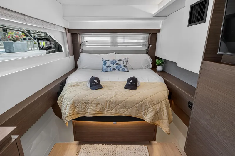Slide: The Image of Luxurious bedroom interior of 2022 Leopard 53 Powercat yacht with cozy bedding and decor. - 83