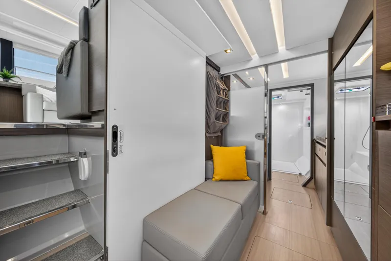Slide: The Image of Interior of 2022 Leopard 53 Powercat yacht, featuring modern design and cozy seating area. - 91