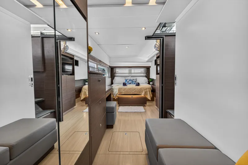 Slide: The Image of Luxurious interior of 2022 Leopard 53 Powercat yacht with modern bedroom and seating area. - 92