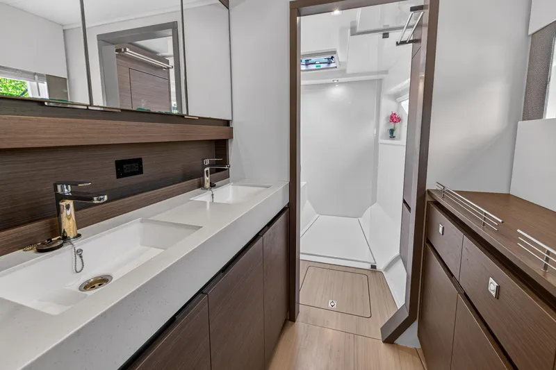 Slide: The Image of Luxurious bathroom interior of 2022 Leopard 53 Powercat yacht with dual sinks and modern design. - 93