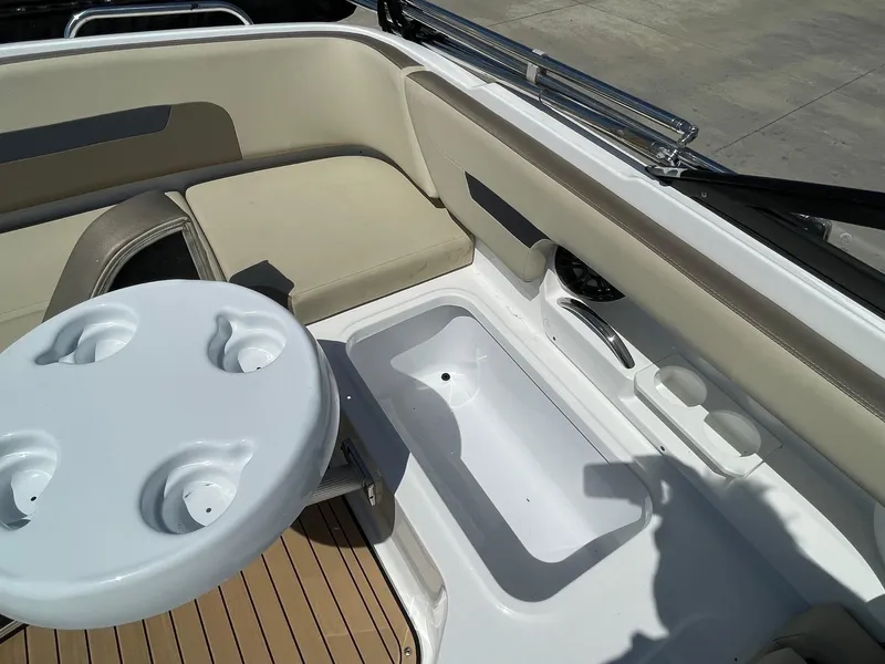 Slide: The Image of Interior of 2020 Hurricane SD235 boat with seating and table setup. - 7