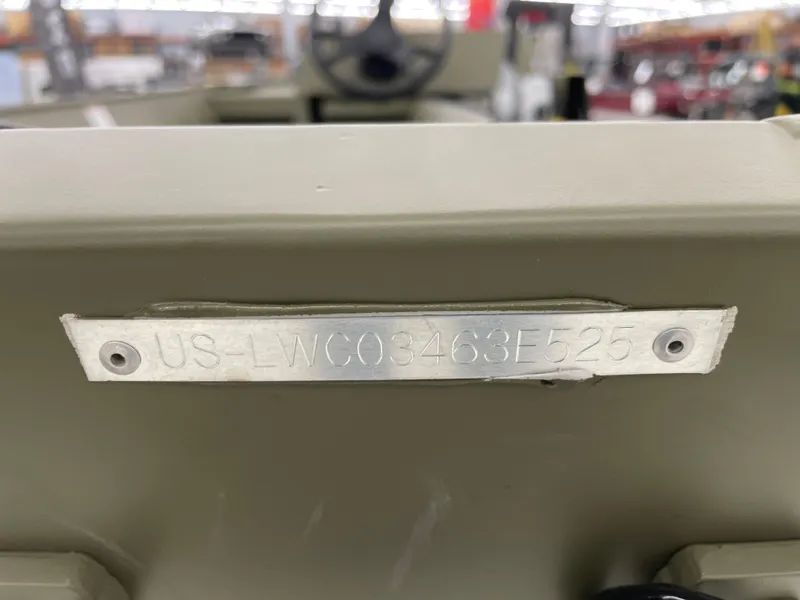 Slide: The Image of 2025 Lowe Jon L1852MT boat with visible hull identification number plate. - 9