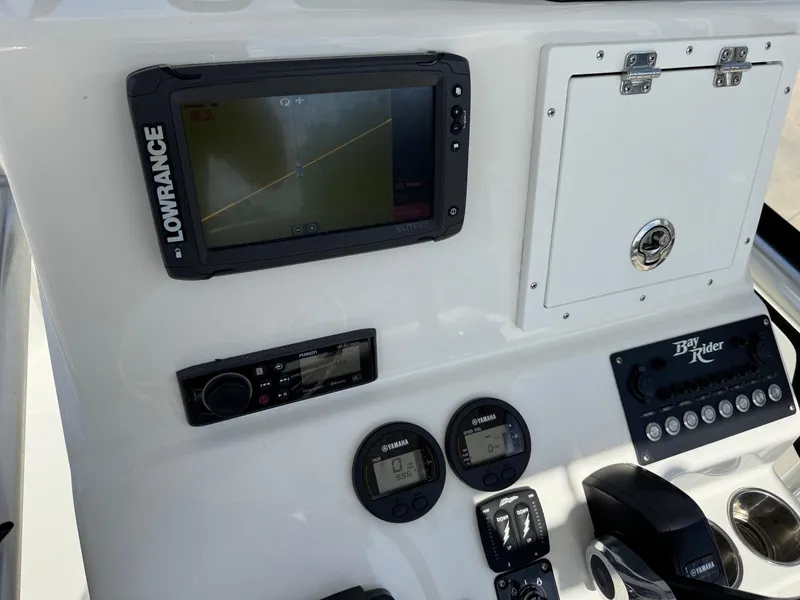 Slide: The Image of Control panel of 2020 Bay Rider 239 Bay boat with Lowrance navigation system. - 15