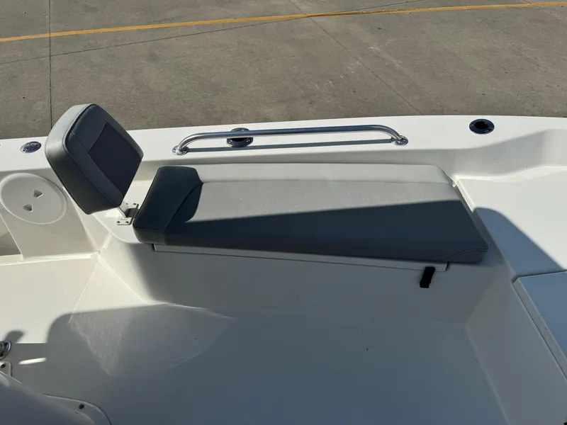 Slide: The Image of 2020 Bay Rider 239 Bay boat interior with gray cushioned seating and stainless steel handrail. - 23