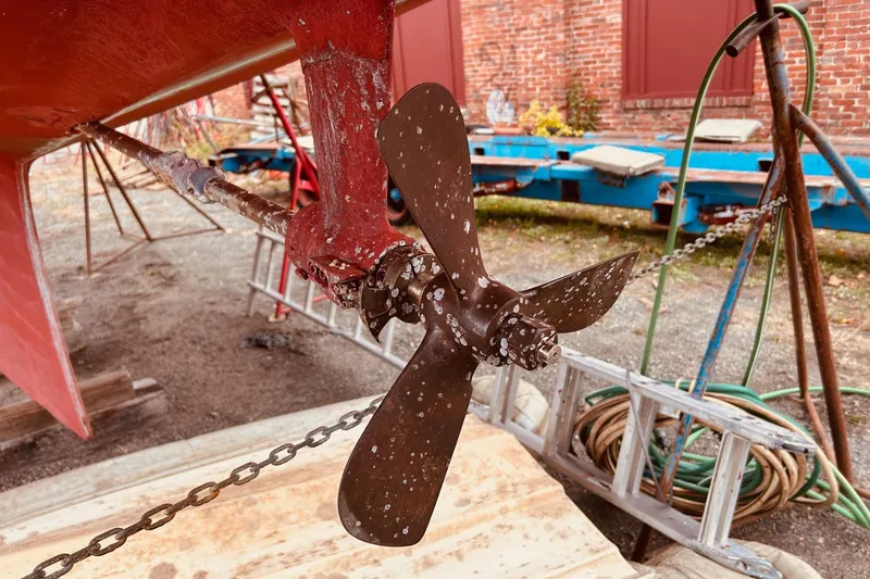 Slide: The Image of Propeller of a 1983 Stevens 40 boat, showing wear and barnacles. - 43
