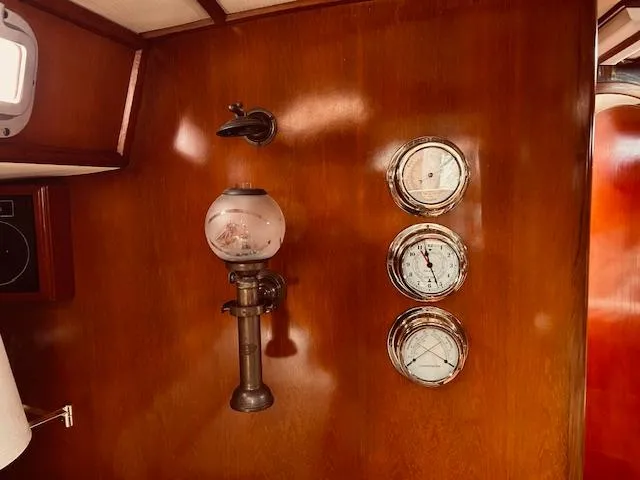 Slide: The Image of Wall-mounted gauges and vintage lamp on Stevens 40 yacht, 1983 model. - 7