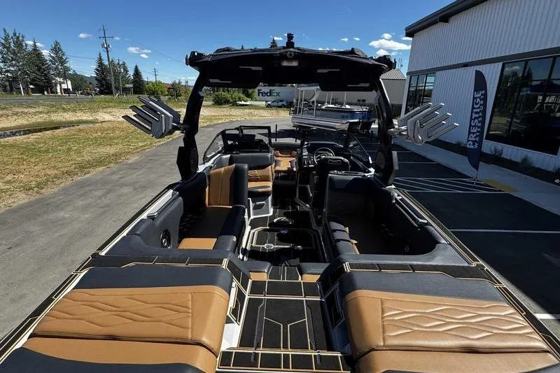 Slide: The Image of 2025 Supra SE boat interior with luxurious seating and modern design. - 15