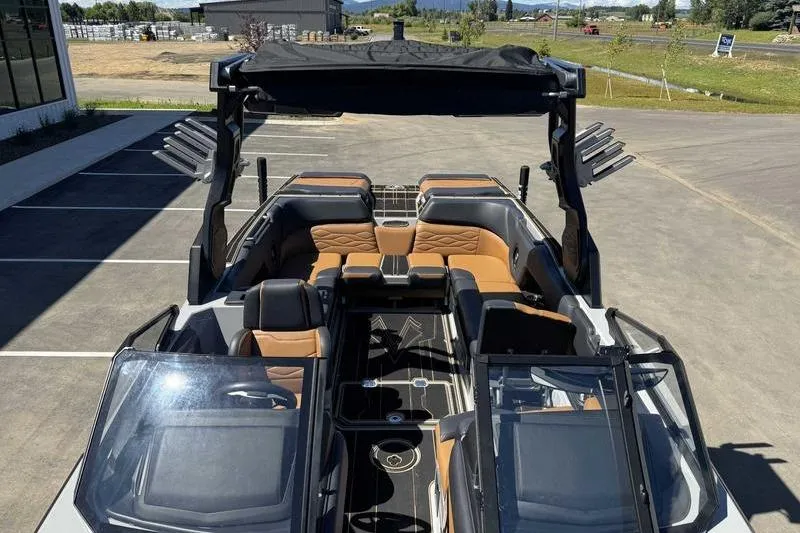 Slide: The Image of 2025 Supra SE boat interior with luxurious seating and modern design. - 16