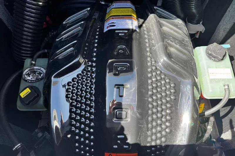 Slide: The Image of 2025 Supra SE engine close-up with detailed components and labels. - 17