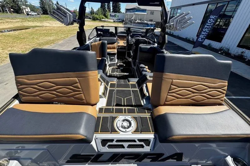 Slide: The Image of 2025 Supra SE boat interior with luxurious seating and modern design. - 8