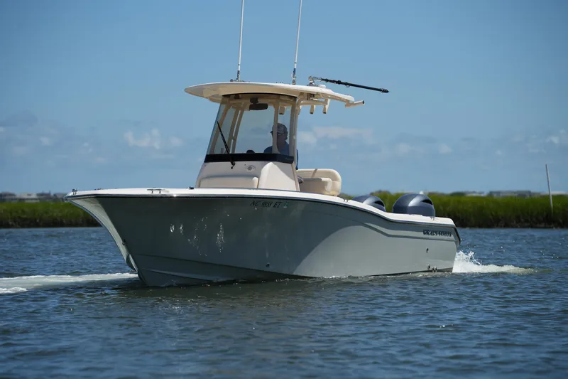 Slide: The Image of 2022 Grady-White Fisherman 257 boat cruising on a sunny day. - 3