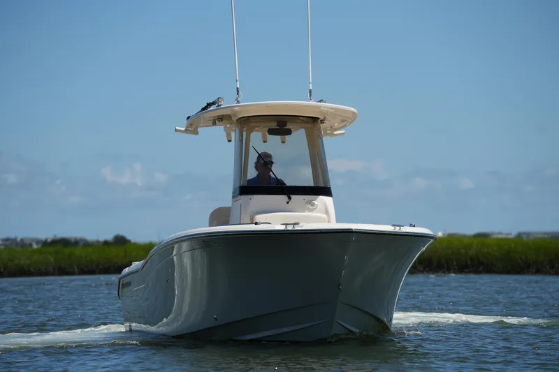 Slide: The Image of 2022 Grady-White Fisherman 257 boat cruising on a sunny day. - 6