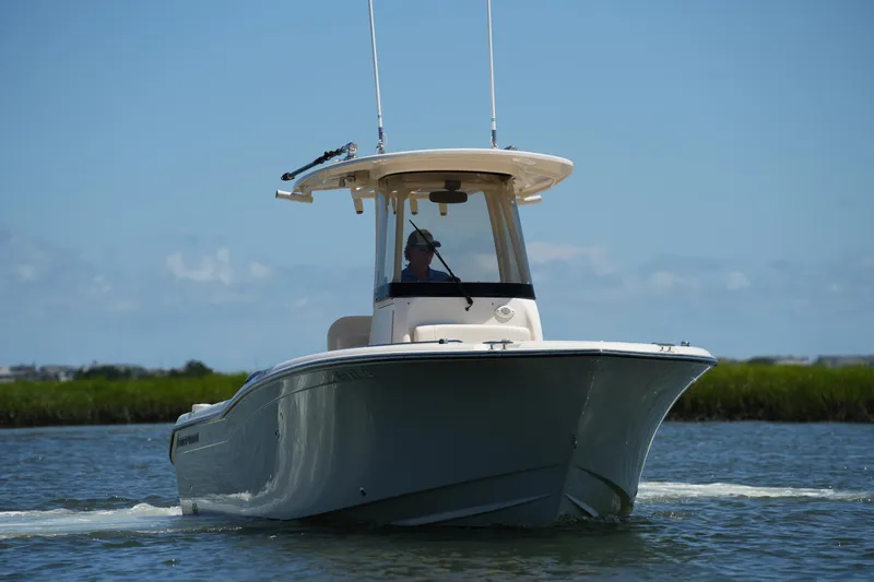 Slide: The Image of 2022 Grady-White Fisherman 257 boat cruising on a sunny day. - 7