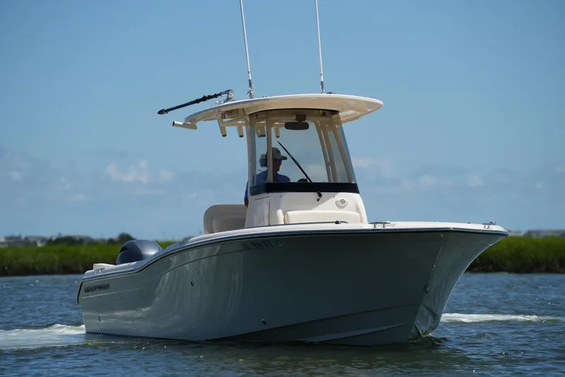 Slide: The Image of 2022 Grady-White Fisherman 257 boat cruising on a sunny day. - 8