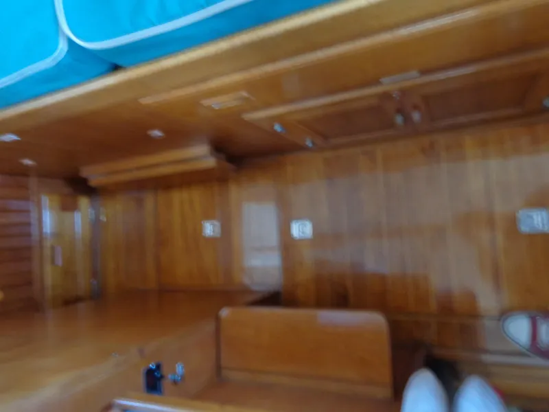 Slide: The Image of Engine room of 1984 Sundowner Tug Pilothouse with Perkins filter and red wiring. - 29