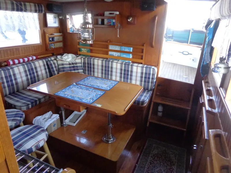 Slide: The Image of 1984 Sundowner Tug Pilothouse dashboard with navigation and communication equipment. - 33