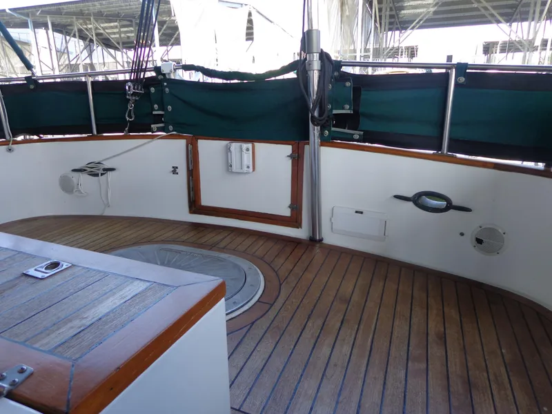 Slide: The Image of 1984 Sundowner Tug Pilothouse bathroom with sink, towels, and toiletries. - 36