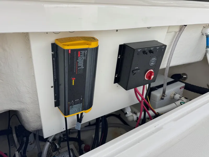 Slide: The Image of 2020 Robalo R222 Center Console boat electrical system with ProMariner ProSport charger. - 13