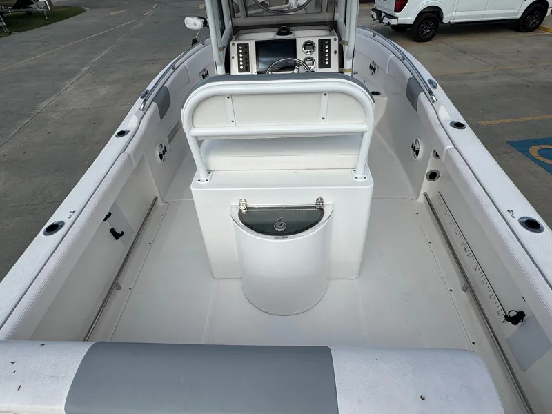 Slide: The Image of 2020 Robalo R222 Center Console boat interior with seating and console view. - 6