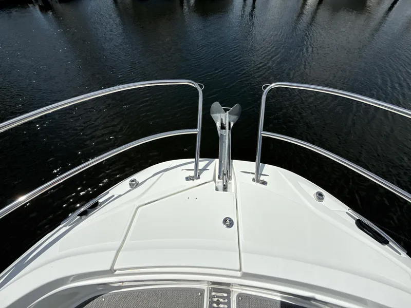 Slide: The Image of Bow of 2022 Jeanneau Leader 10.5 WA Series 2 boat on water. - 24