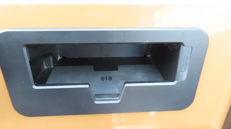 Slide: The Image of Charging dock on 2025 Princecraft Vogue 27 RL boat, featuring wireless charging symbol. - 19