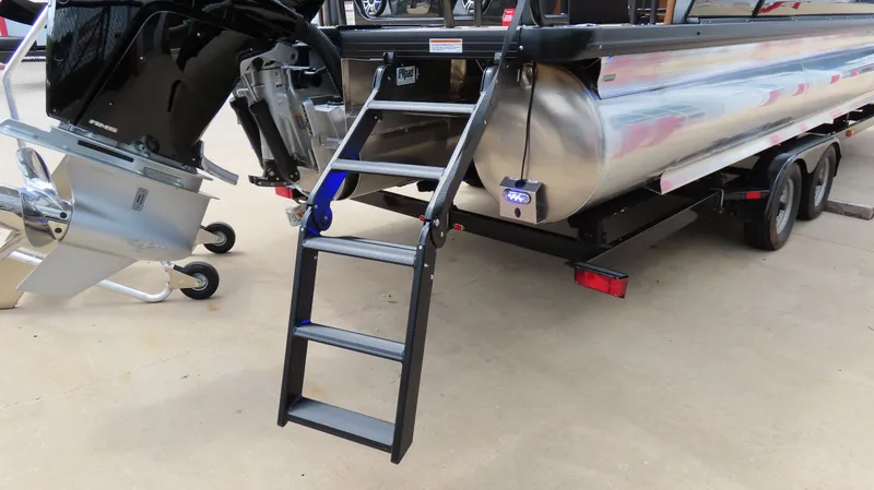 Slide: The Image of 2025 Princecraft Vogue 27 RL pontoon boat with motor and boarding ladder. - 25