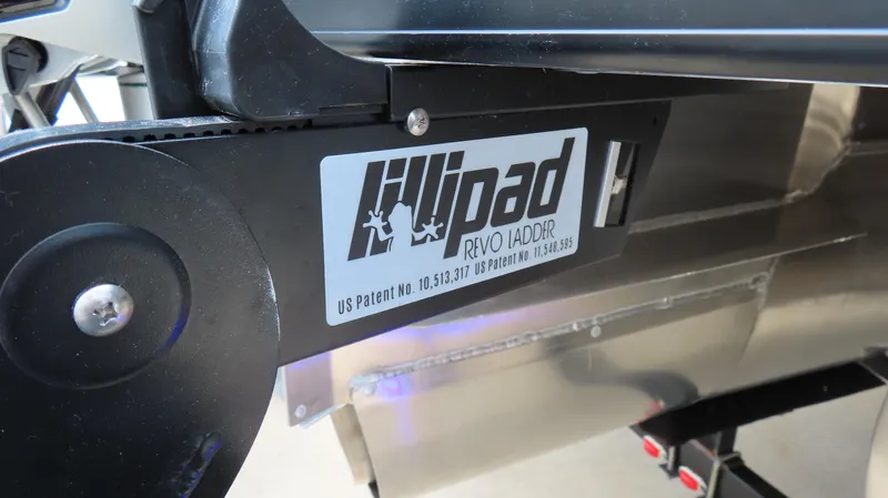 Slide: The Image of 2025 Princecraft Vogue 27 RL with Lilipad Revo Ladder, patent details visible. - 26