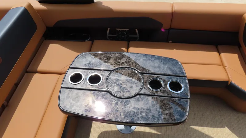 Slide: The Image of Luxurious seating and table on 2025 Princecraft Vogue 27 RL boat. - 8