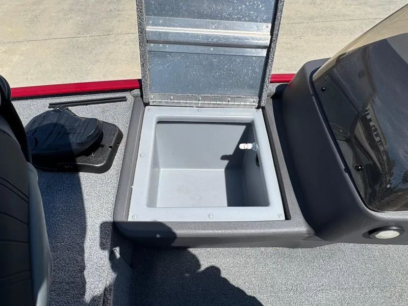Slide: The Image of Open storage compartment on 2020 Bass Tracker Classic 16 boat deck. - 12