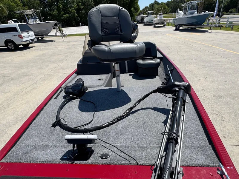 Slide: The Image of 2020 Bass Tracker Classic 16 boat with seating and equipment on a sunny day. - 7