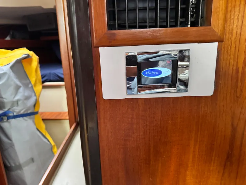 Slide: The Image of Interior of 1981 C&C 37 sailboat with Mabru air conditioning control panel. - 33