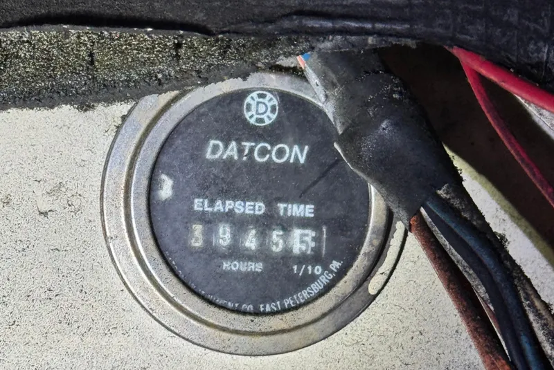 Slide: The Image of Datcon elapsed time meter showing 3946.5 hours on a 1981 C&C 37. - 38