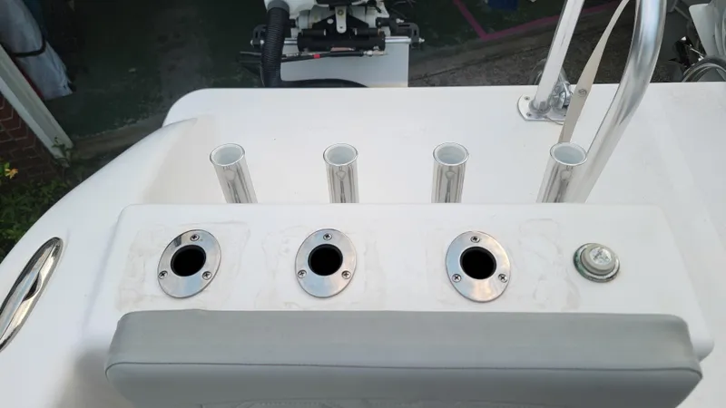 Slide: The Image of 2023 Twin Vee 260 CC GF boat rod holders and seating detail. - 22