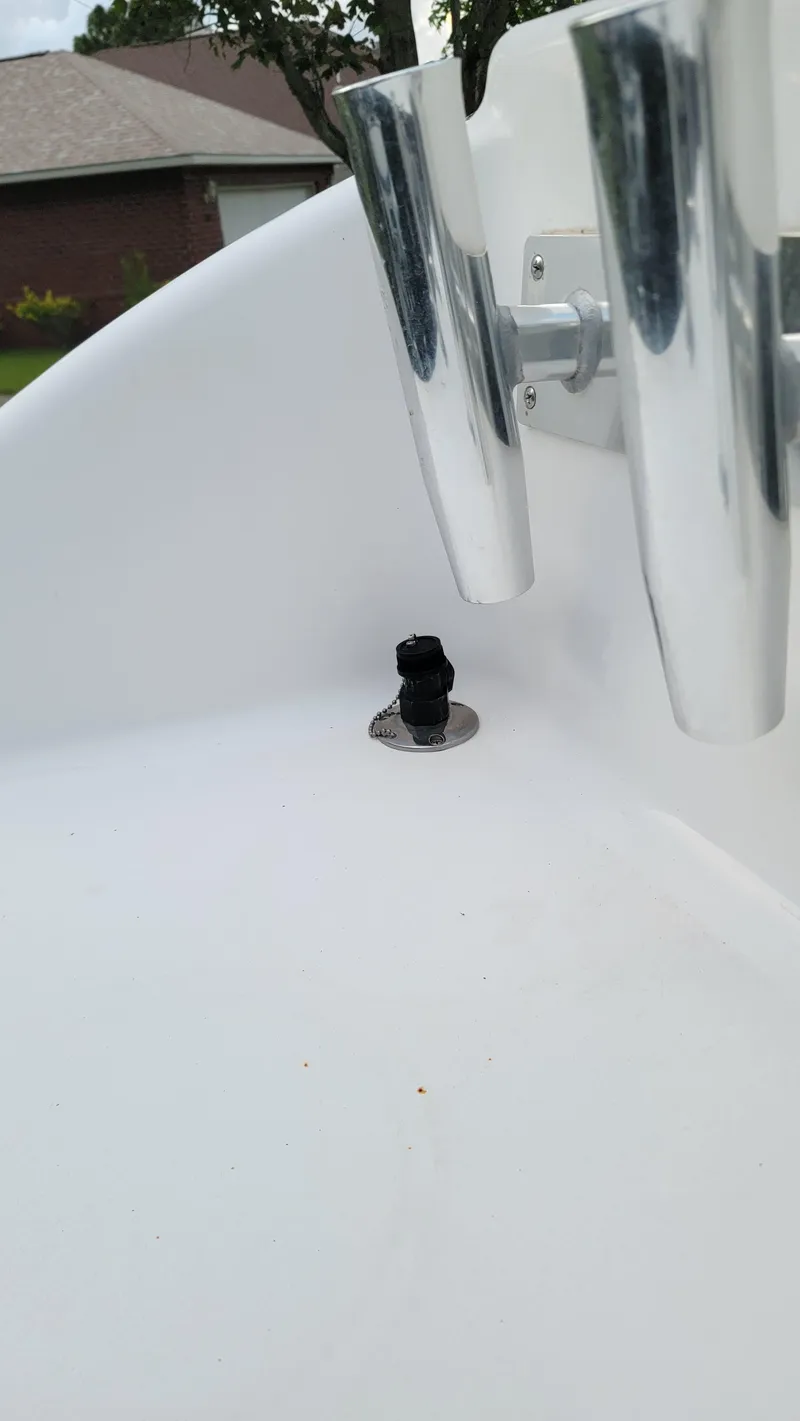 Slide: The Image of 2023 Twin Vee 260 CC GF boat detail with rod holders and deck fitting. - 23