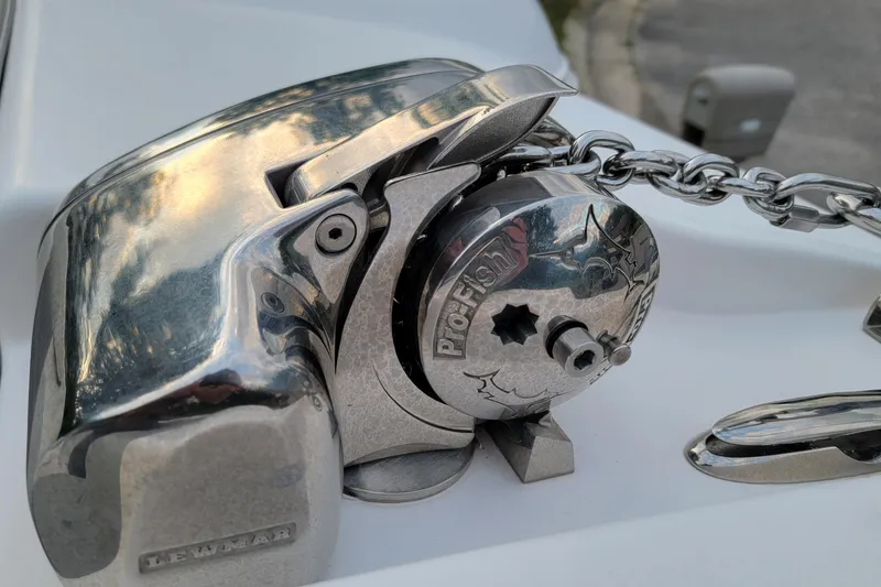 Slide: The Image of Lewmar Pro-Fish windlass on 2023 Twin Vee 260 CC GF boat, featuring a polished metal finish. - 35