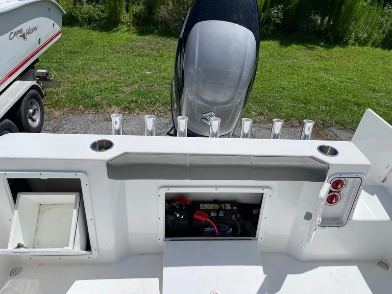 Slide: The Image of 2021 Cape Horn 22 OS boat with engine and storage compartments. - 18