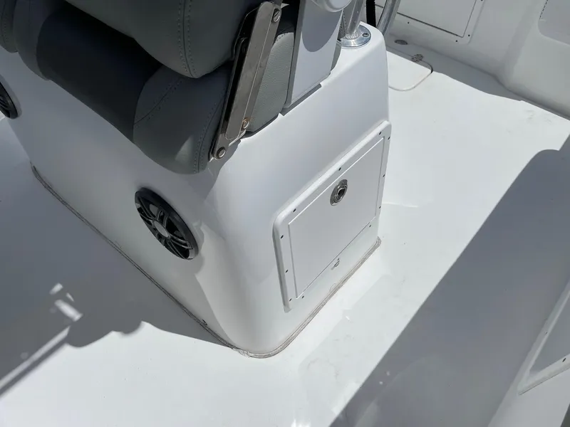 Slide: The Image of 2021 Cape Horn 22 OS boat interior with storage compartment and seating. - 5