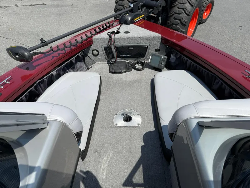 Slide: The Image of 2012 Tracker Targa V-18 Combo boat interior with seating and equipment. - 13