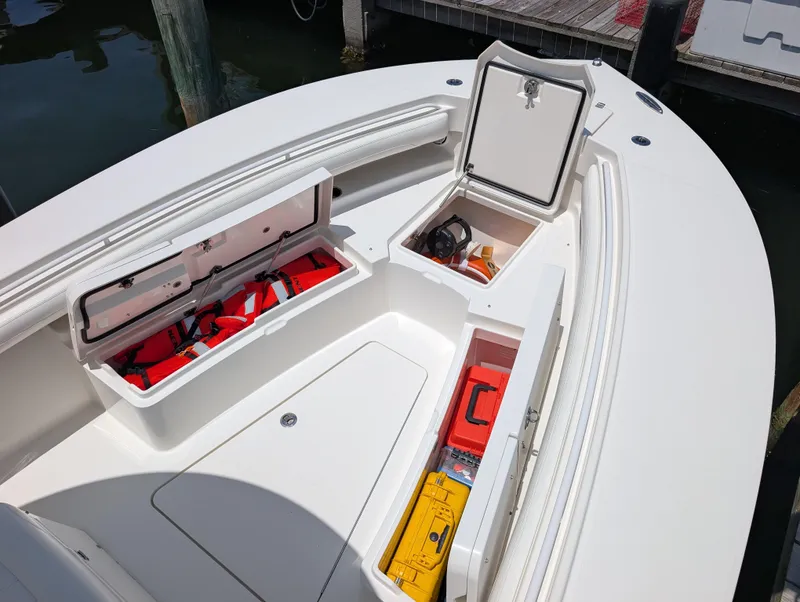 Slide: The Image of REGULATOR 28 BOW VIEW - COMPARMENTS OPEN - 24