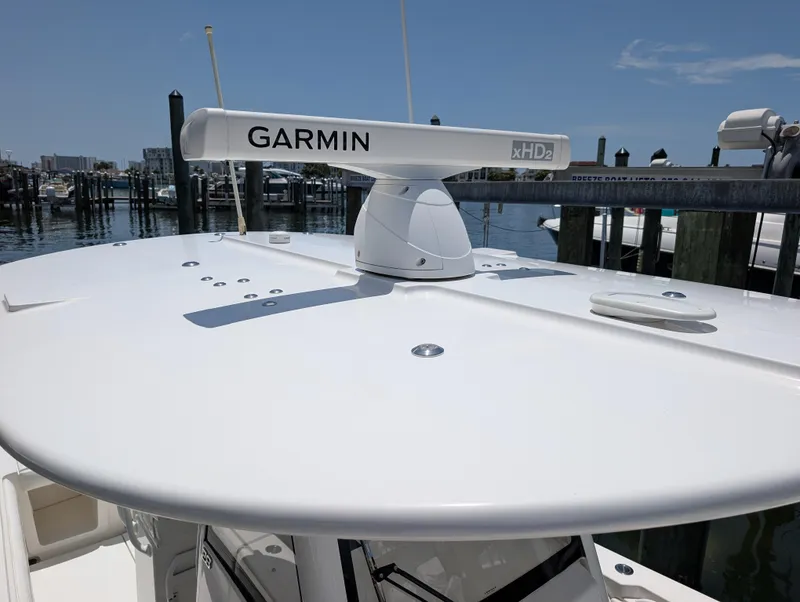 Slide: The Image of REGULATOR 28 HARD TOP VIEW - GARMIN OPEN ARRAY RADAR, GXM54, HELM MASTER ANTENNA - 38