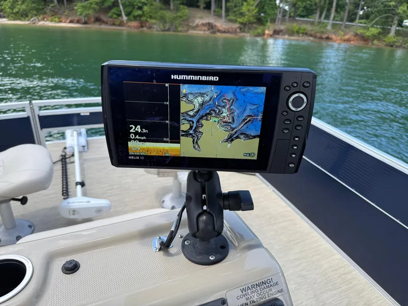 Slide: The Image of Fishfinder on 2017 Silver Wave 230 Island CC boat, displaying depth and map near shoreline. - 30