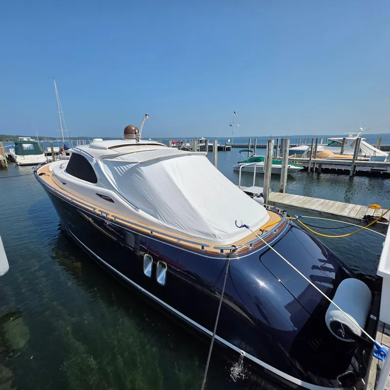 Slide: The Image of Luxury 2013 Zeelander Z44 yacht docked at marina under clear blue sky. - 11