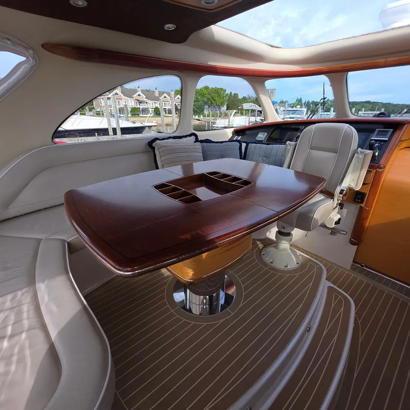 Slide: The Image of Luxurious interior of 2013 Zeelander Z44 yacht with elegant wood table and plush seating. - 18