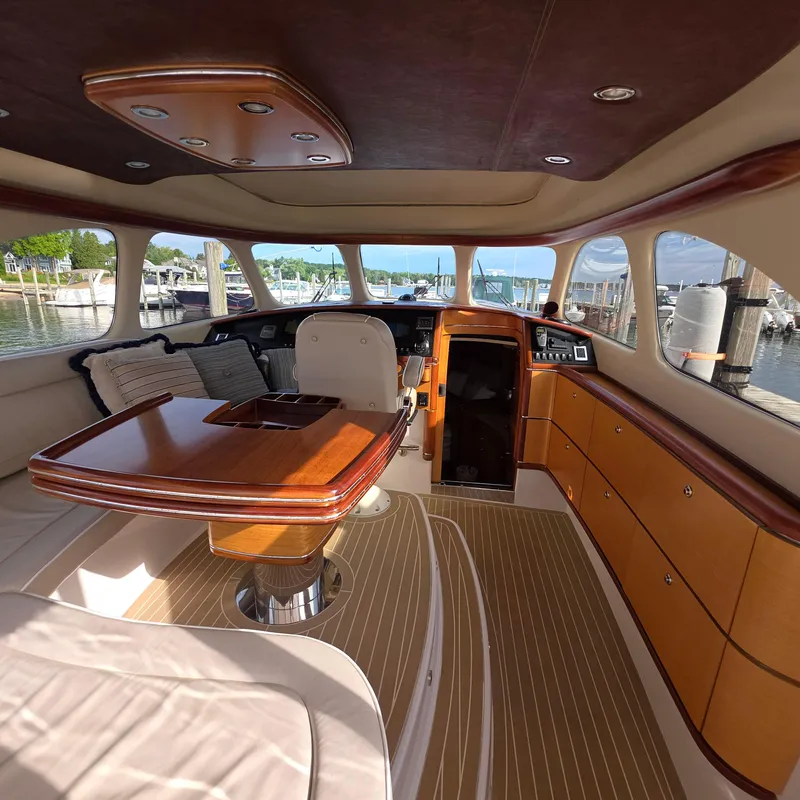 Slide: The Image of Luxurious interior of a 2013 Zeelander Z44 yacht with elegant wood finishes. - 22