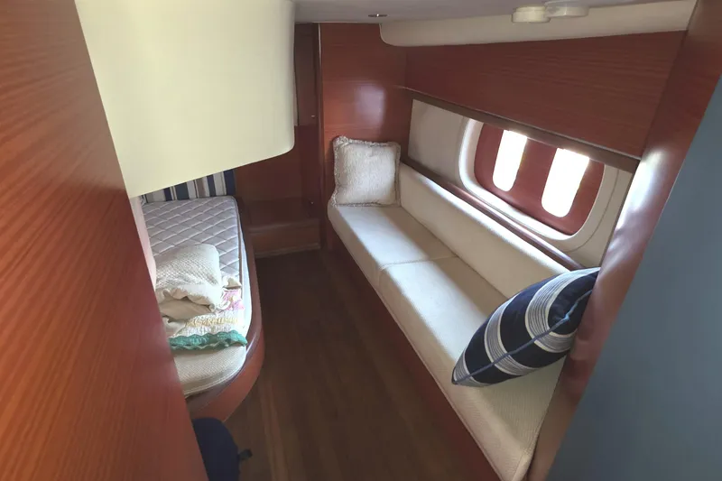 Slide: The Image of Interior of 2013 Zeelander Z44 yacht with cozy seating and wooden finishes. - 23