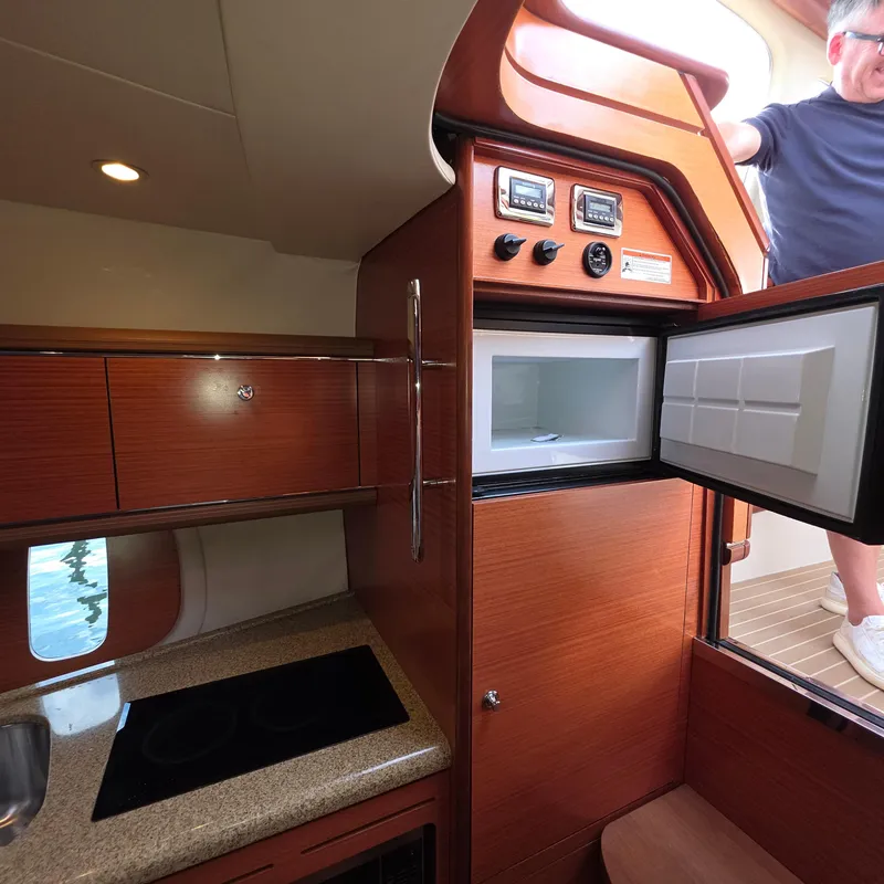 Slide: The Image of Interior of 2013 Zeelander Z44 yacht with wooden cabinetry and modern appliances. - 34