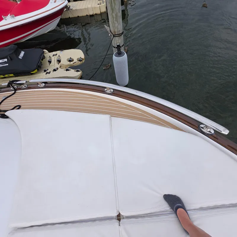 Slide: The Image of Zeelander Z44 yacht deck with cushion, docked near water, 2013 model. - 39